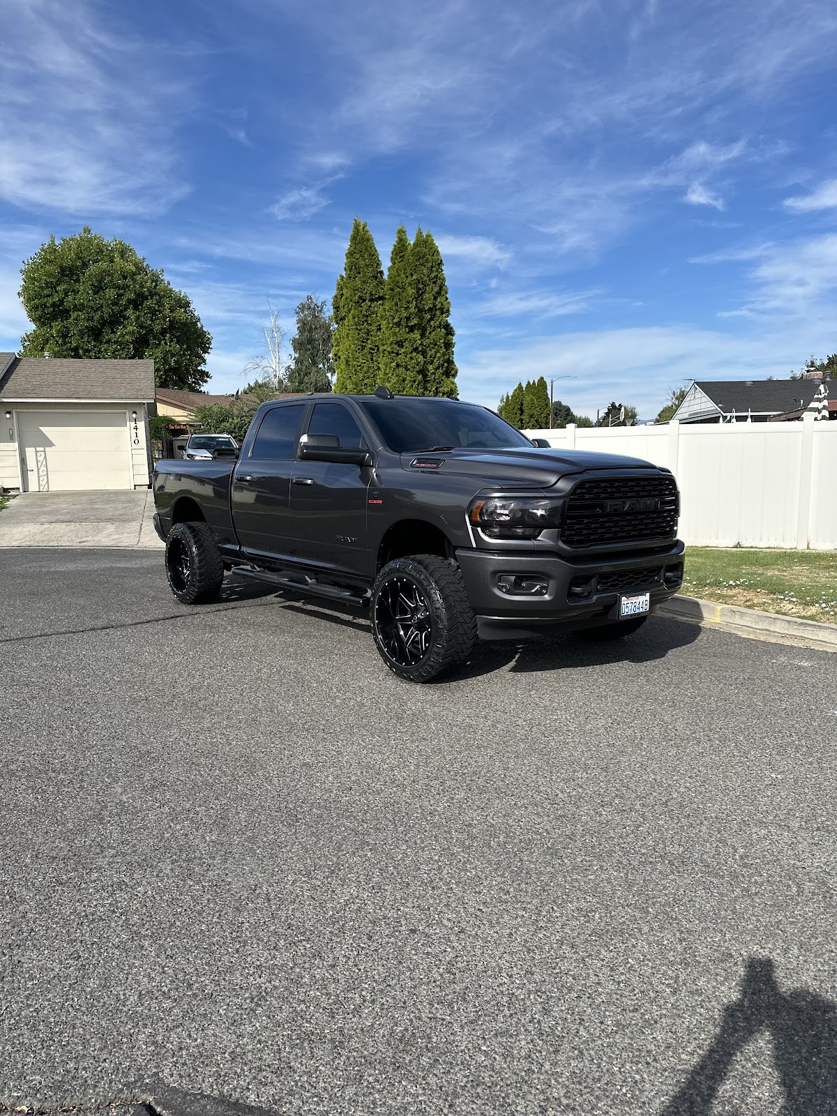 Lifted gray RAM 2500 detailed by Sanchez AutoCare, mirror-gloss paint and fresh window tint